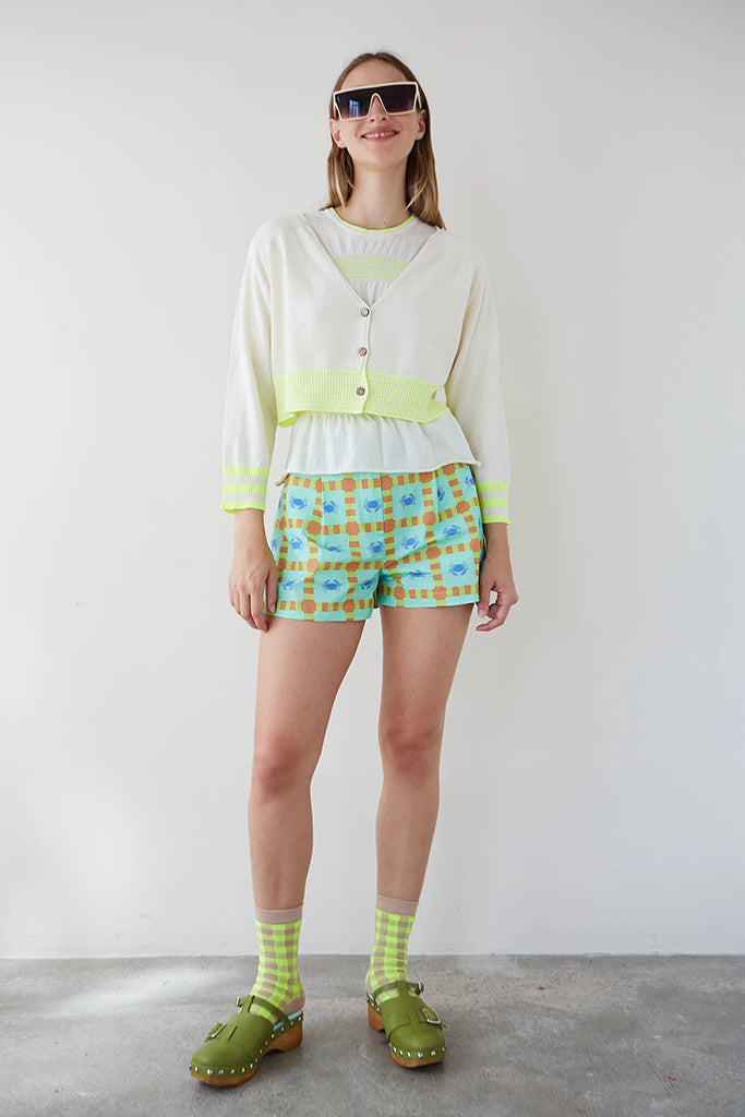 Cardigan corto piripi crudo